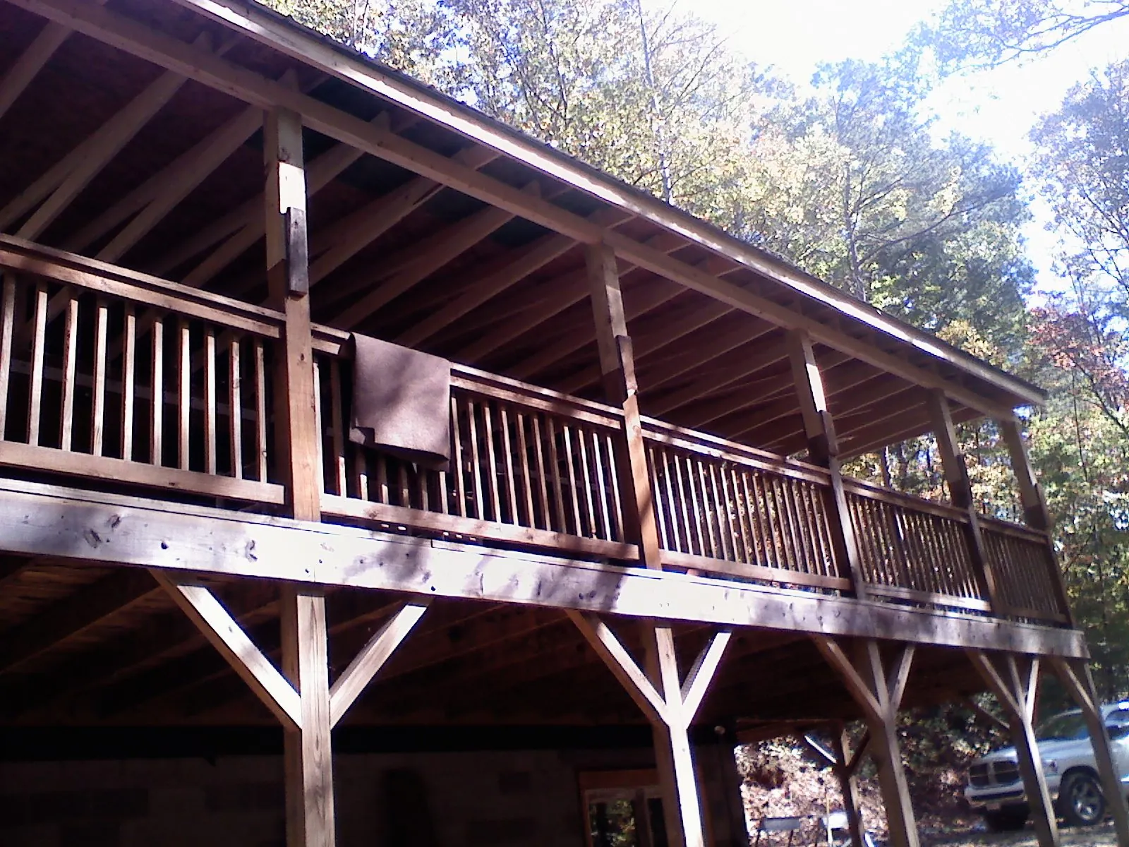 Timber framing under a new elevated porch and deck — Roof Leak Repair in Stevens Point by Roofing Brothers